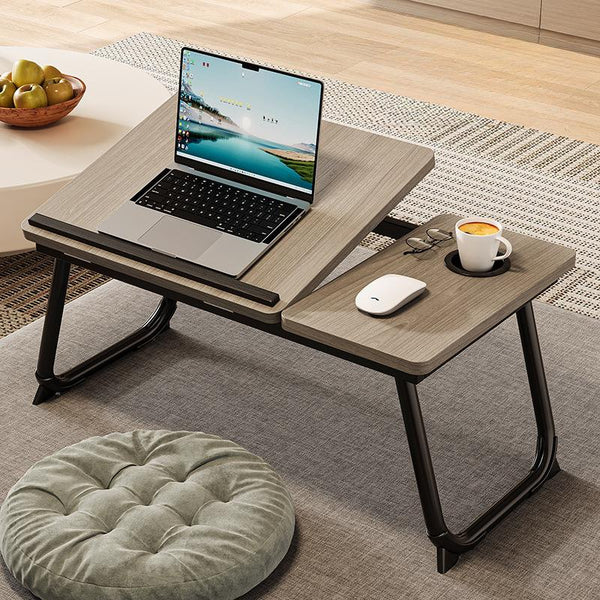 Light oak folding lap desk with a laptop and coffee