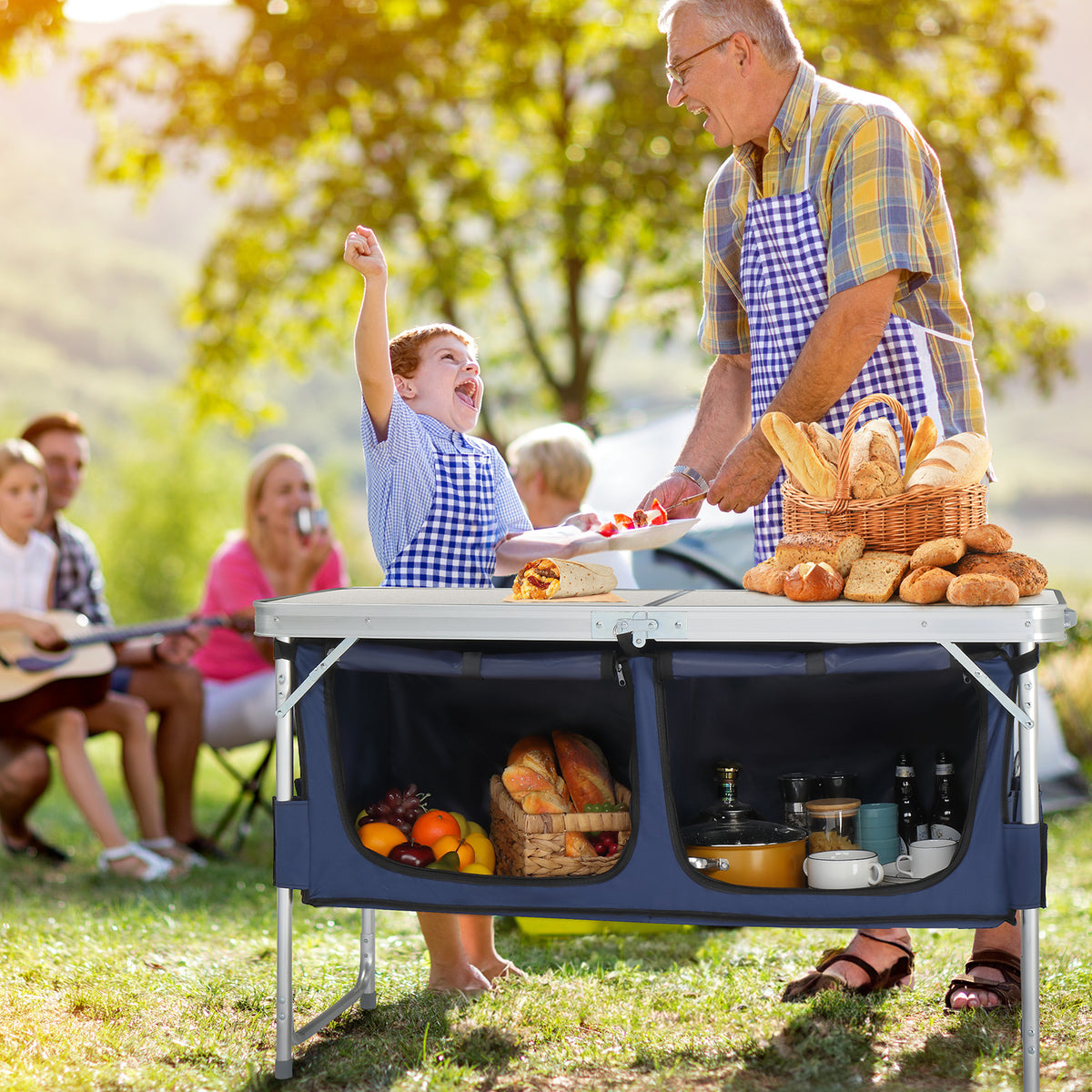 Folding camping table used at a picnic