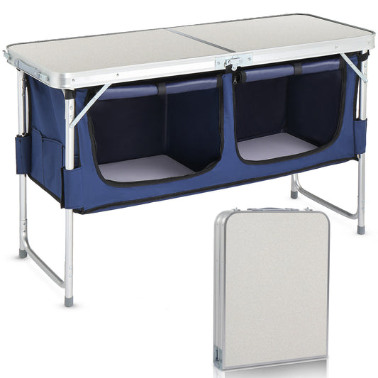 Folding camping table with blue storage compartments