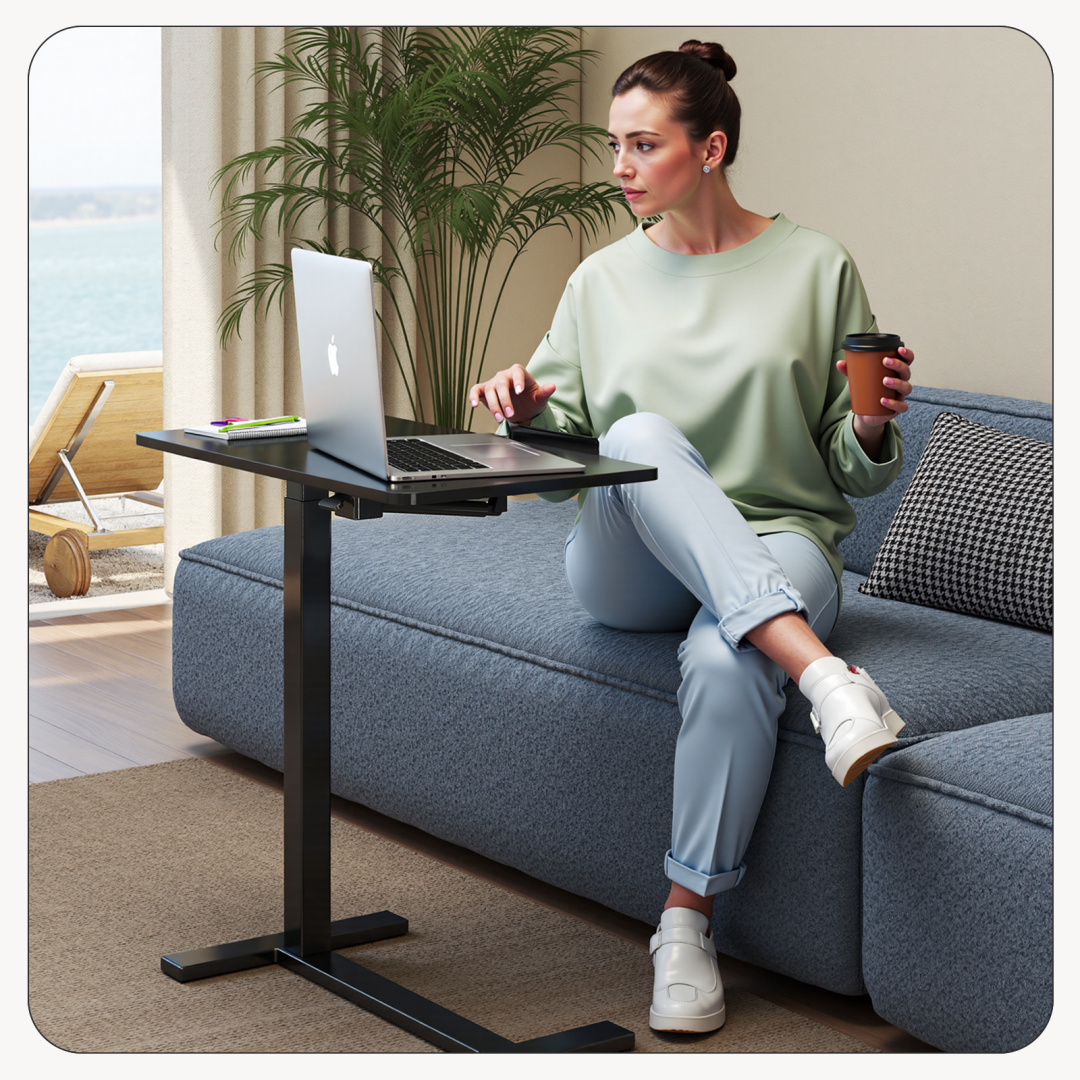 Rolling laptop table used from a sofa