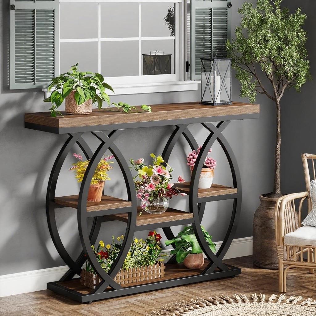 Console table holding plants by a window