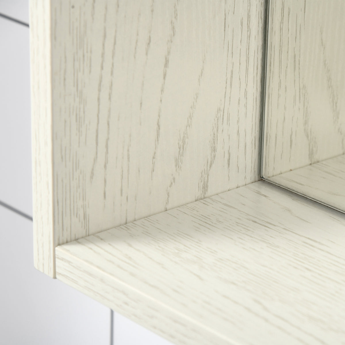 Close-up of the white wood-grain finish