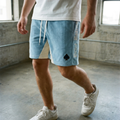 Light blue corduroy street shorts worn with white tee and sneakers